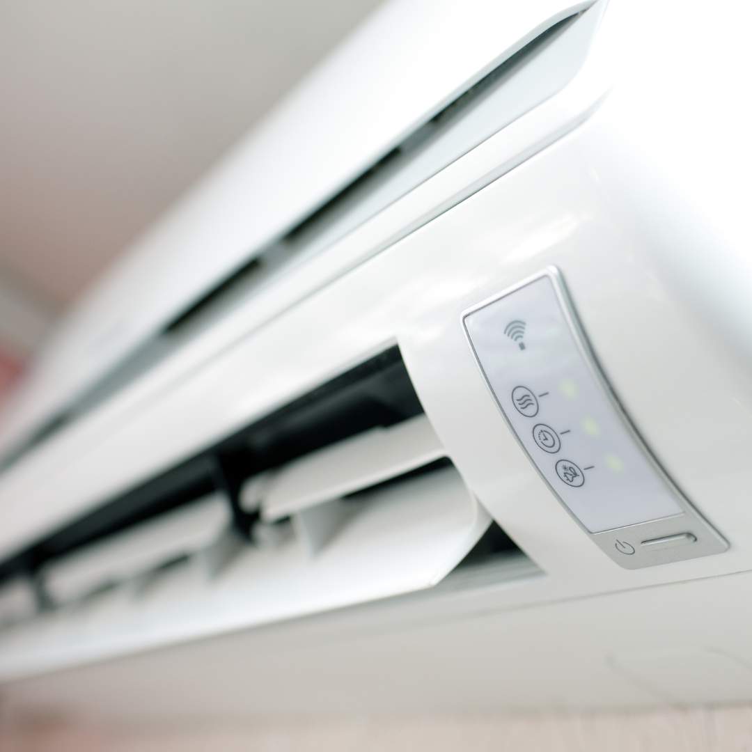 The stylish fascia of a white indoor Air2Air heat pump unit